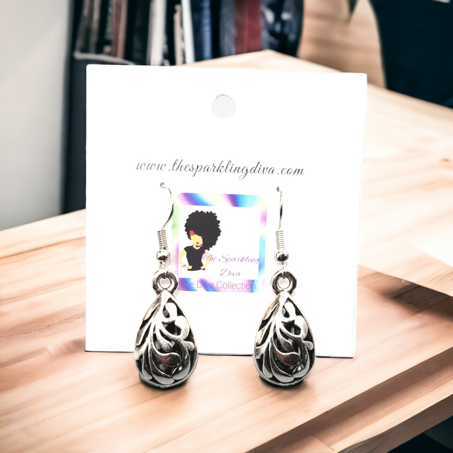 Silver tonned tear drop earrings (Earrings)