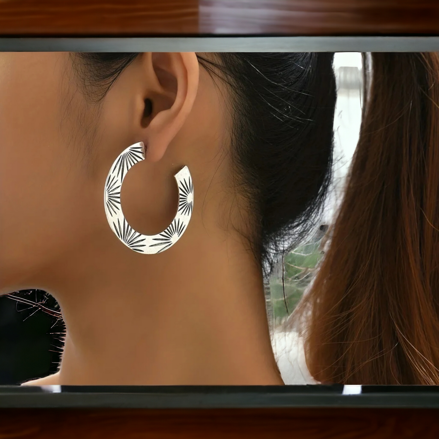 Silver sunrise hoop earrings