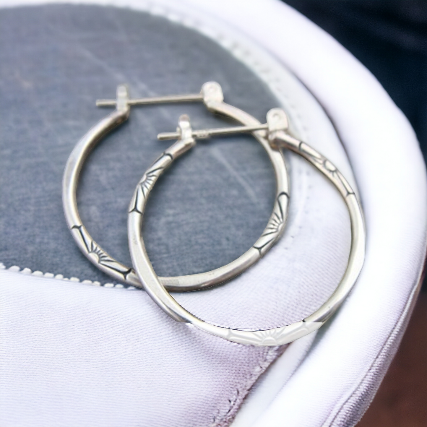 Floral embossed hoop earrings