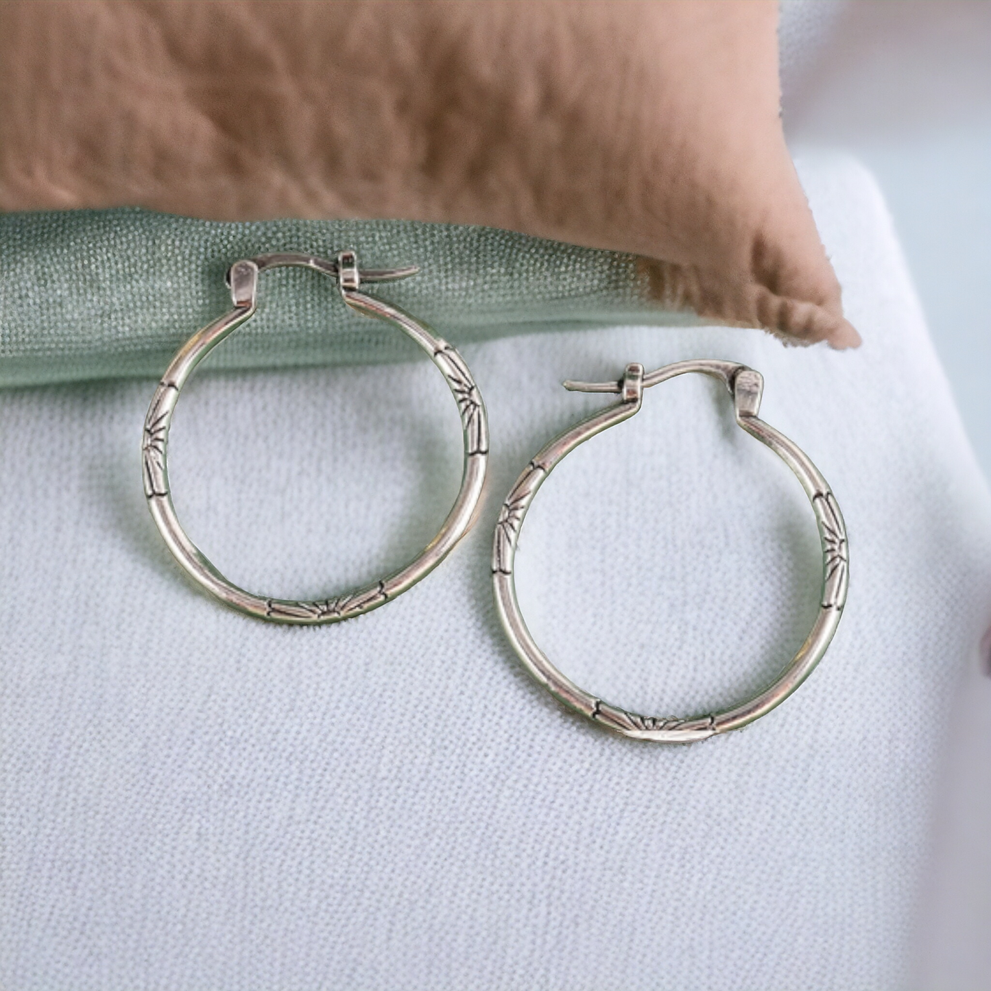 Floral embossed hoop earrings