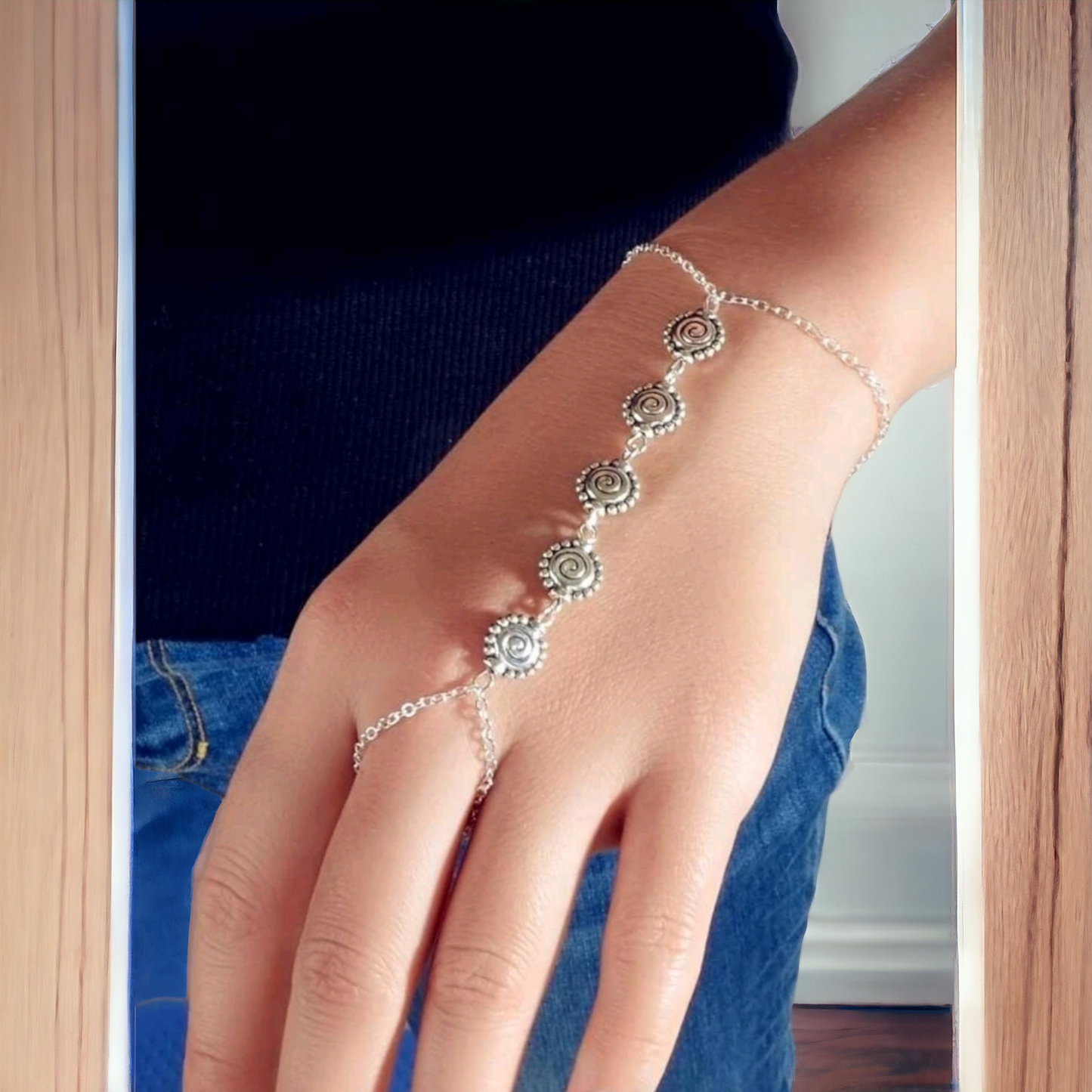 Swirl bracelet ring