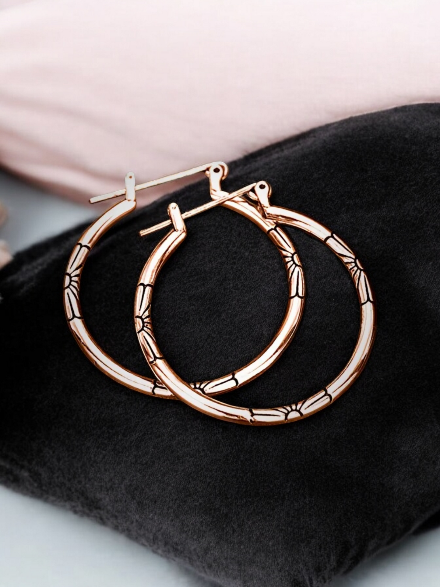 Floral embossed hoop earrings