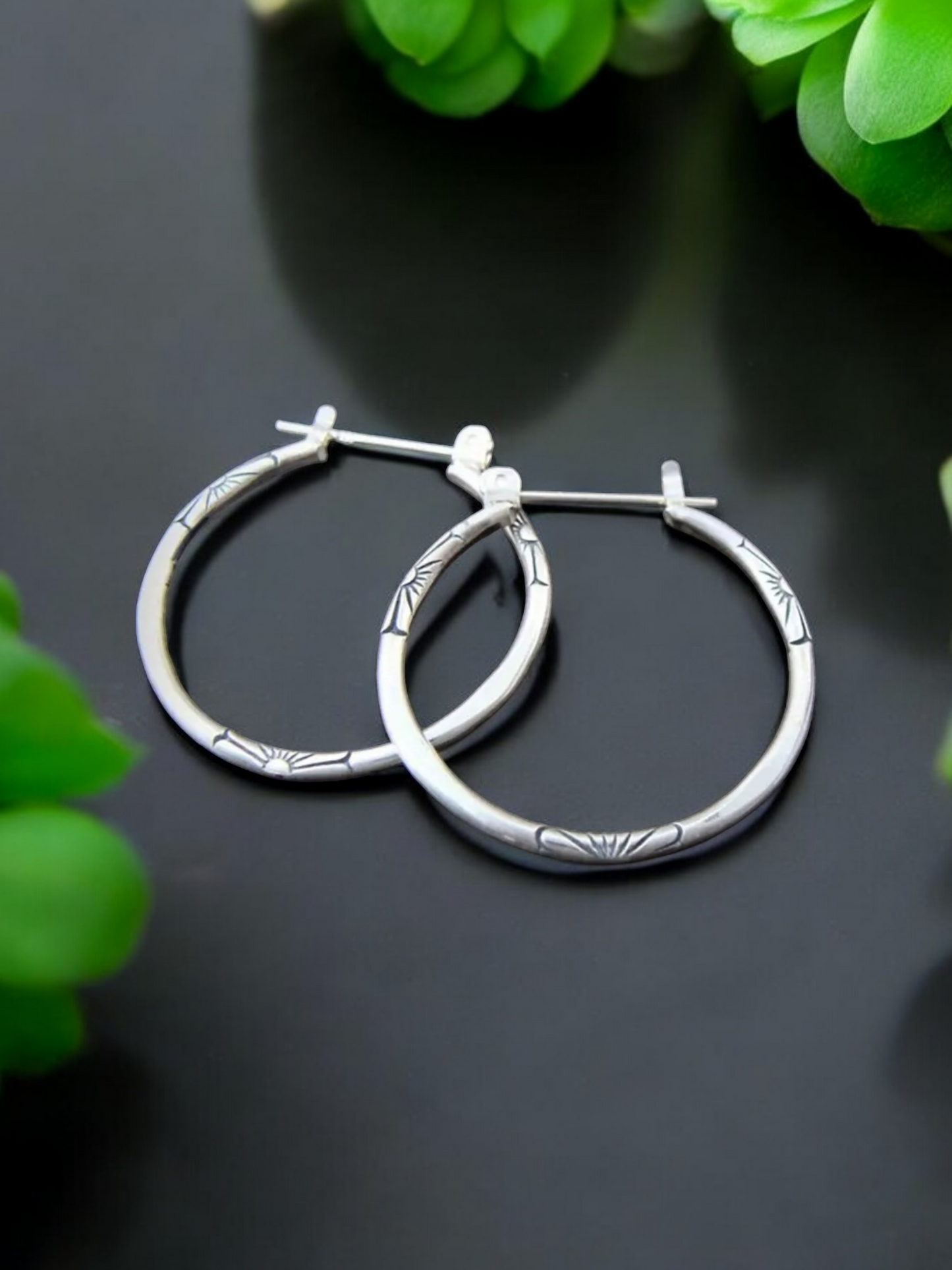 Floral embossed hoop earrings