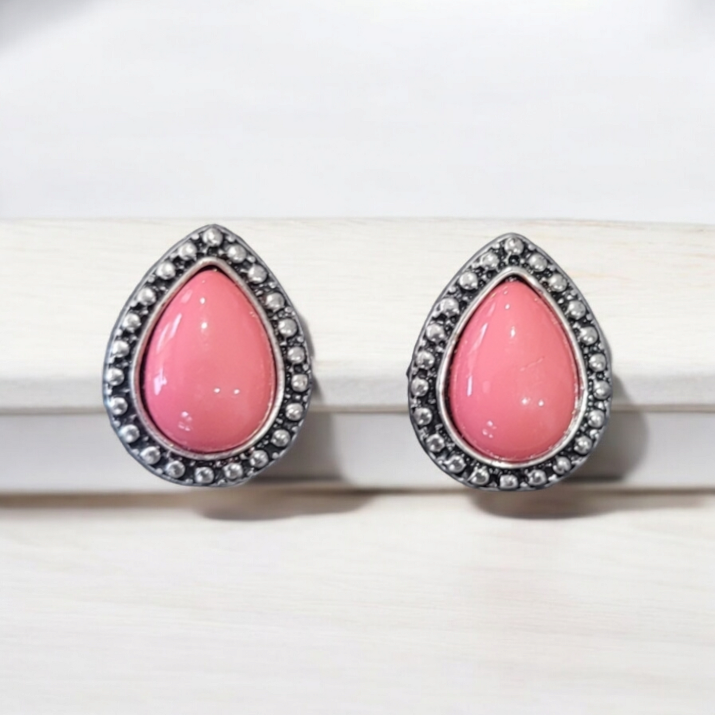 Boldly beaded pink post earrings