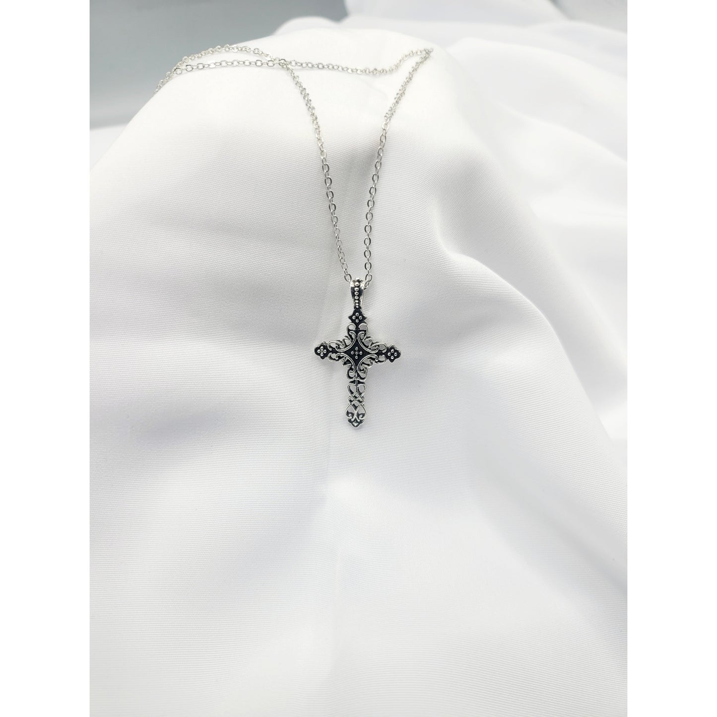 Scrolled cross necklace (Necklaces)