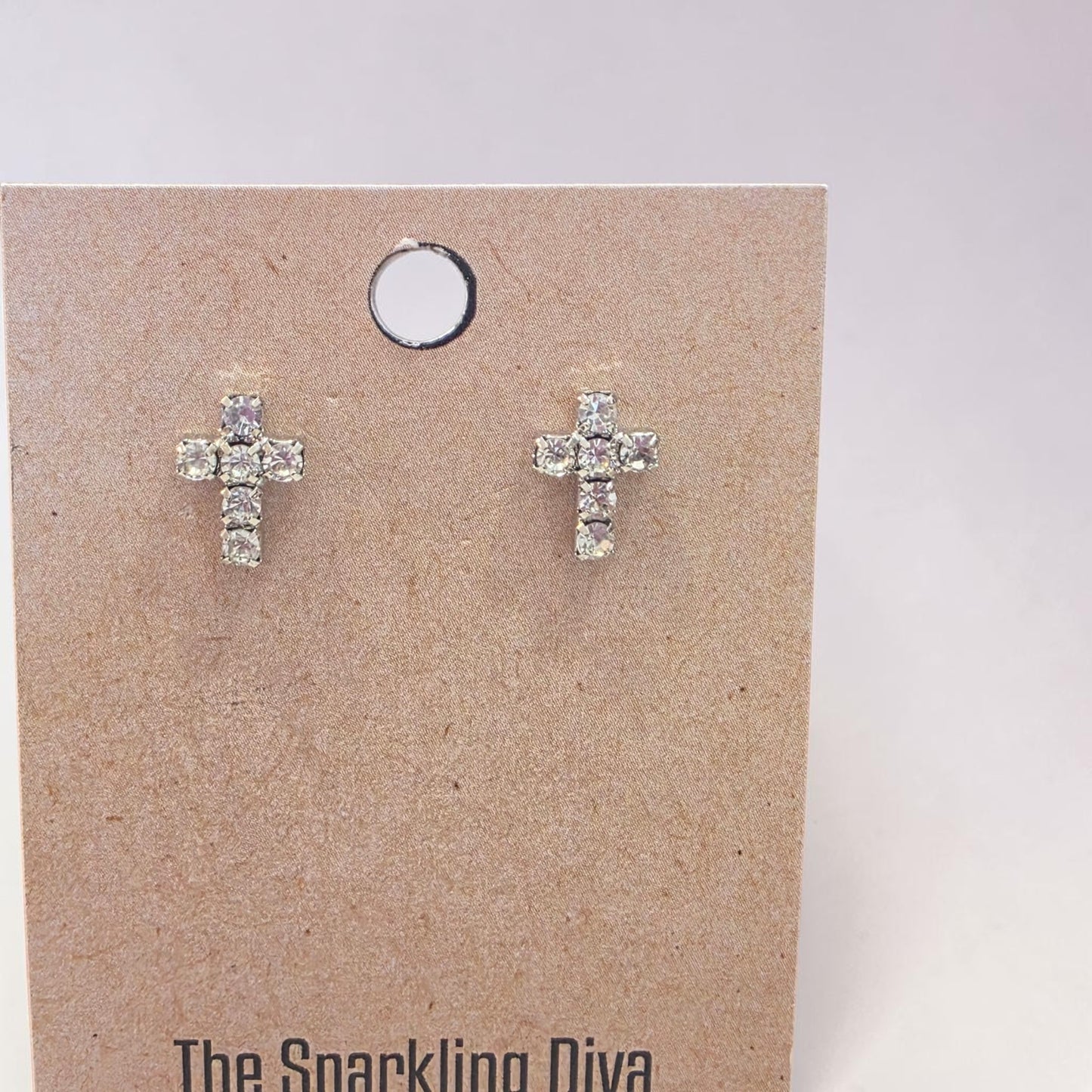 Radiant cross earrings