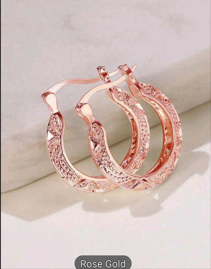 Ornate hoop earrings