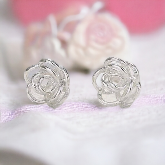 Silver flower studd earrings