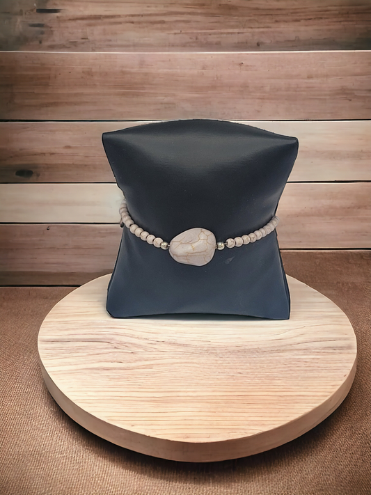 A stone's through grey bracelet