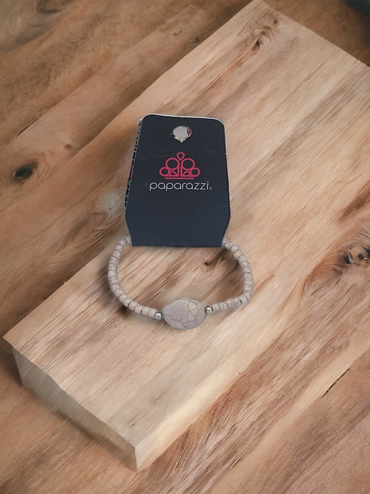 A stone's through grey bracelet
