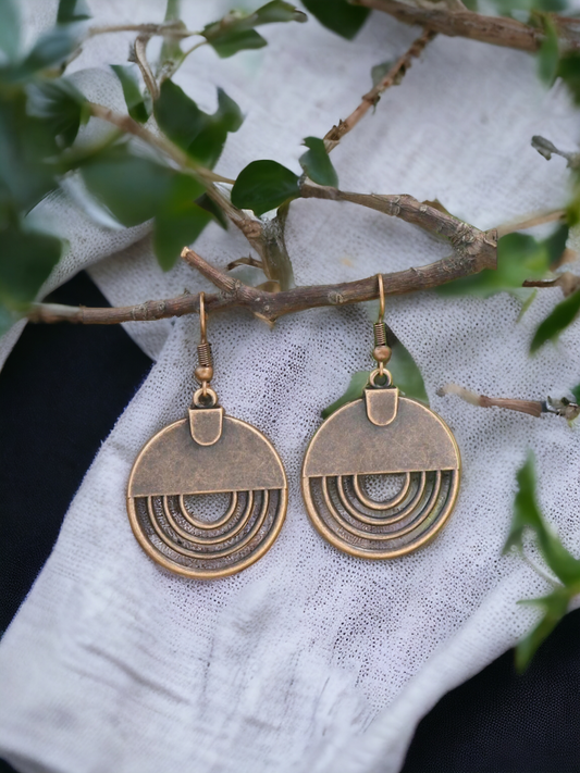 A copper statement earrings