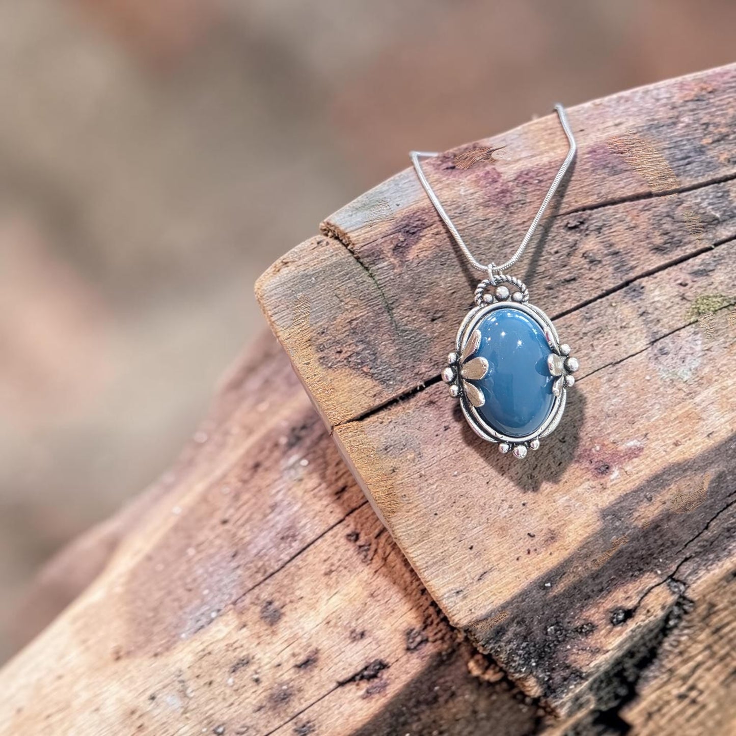 A blue embrace necklace