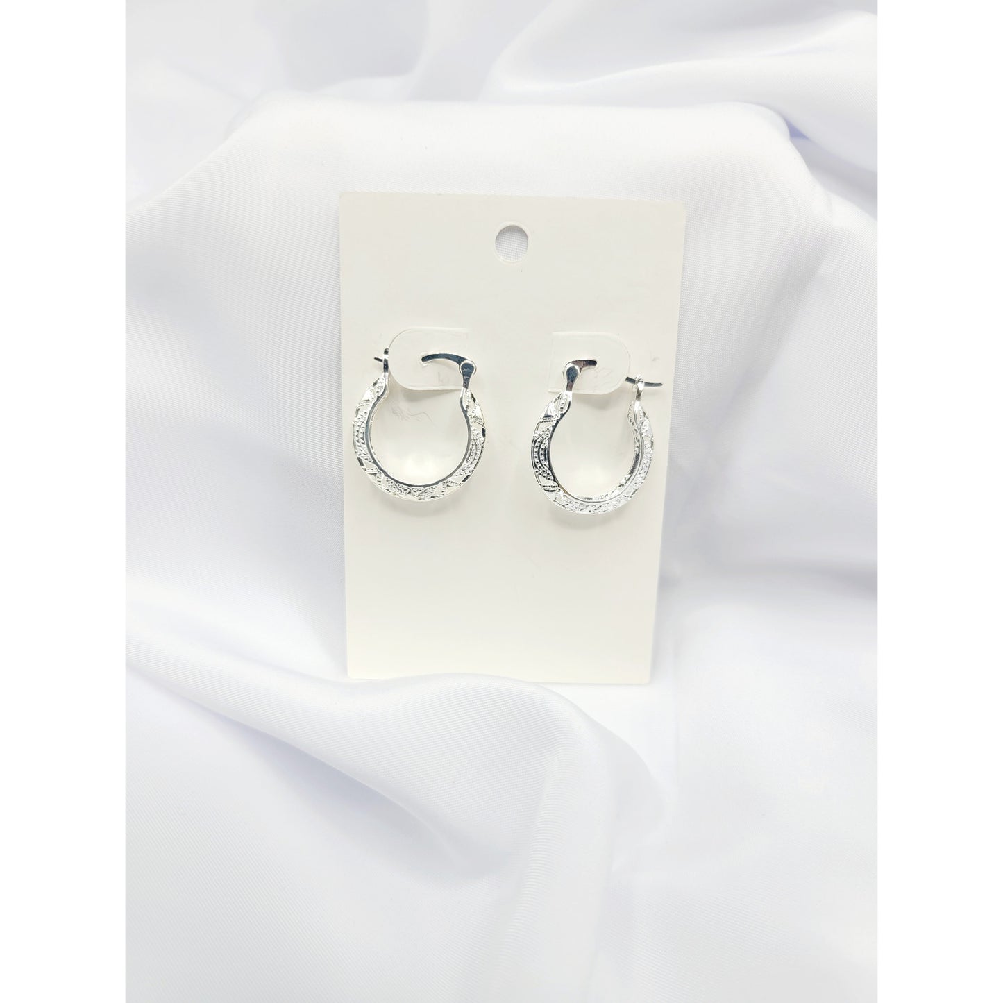 Ornate hoop earrings