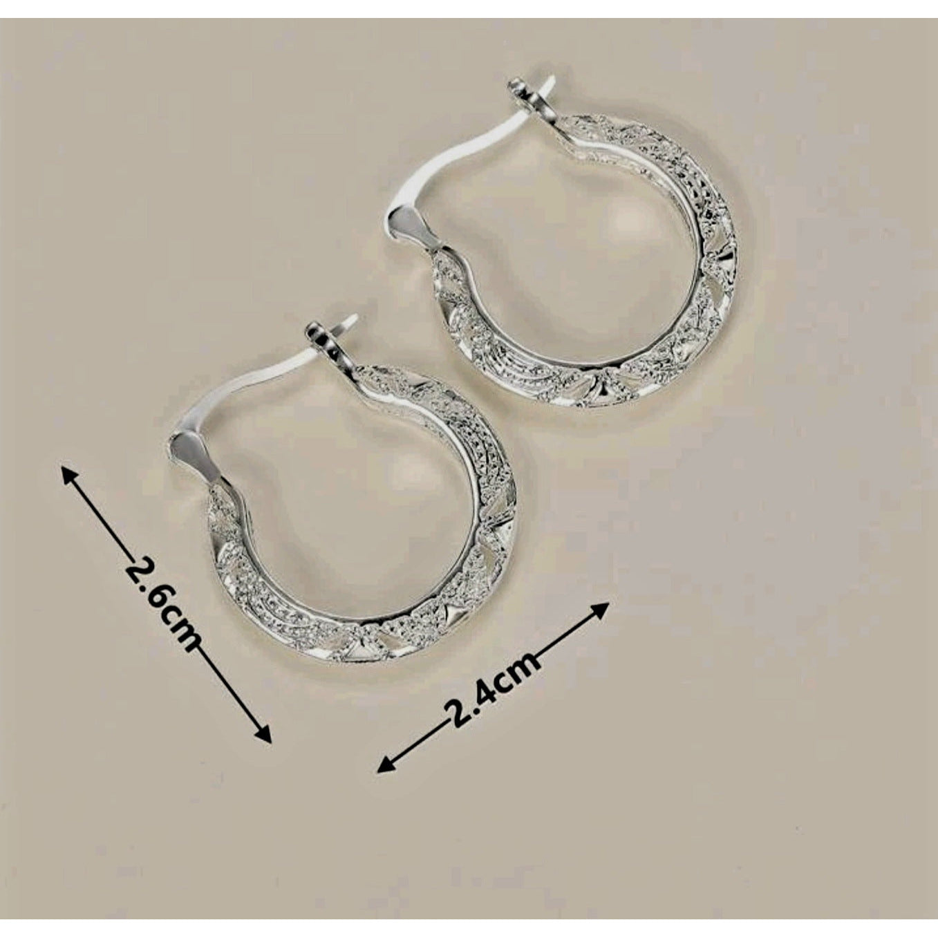 Ornate hoop earrings