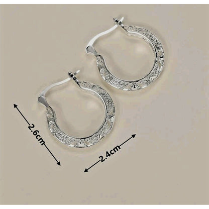 Ornate hoop earrings